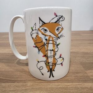 Kate Spade New York x Lenox Festive Fox Wrapped in Lights ceramic mug. 